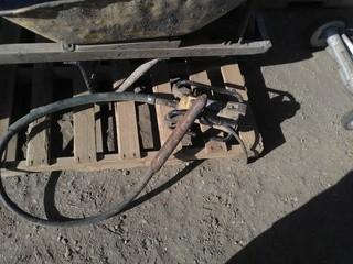 Dunrite 1160A3 Concrete Vibrator and Metal Wheelbarrow.