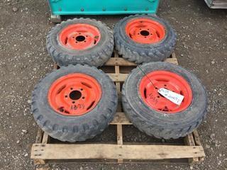 Set of Mini Skid Steer Tires on Rim.