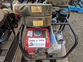 Honda Powered 2" Gas Water Pump c/w (2) Rolls of 2" Discharge Hose.