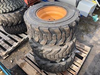 Lot of (3) 12-16.5 Wide Wall Skidsteer Tires & Rims.