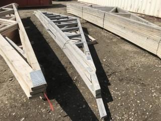 Lot of Approximately (7) 22', 2"x4" Pre Fab Roof Trusses.