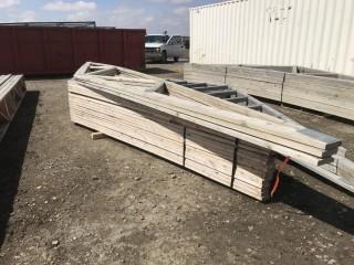 Lot of Approximately (16) 20', 2"x4" Pre Fab Roof Trusses & (2) 22'x2"x4" Pre Fab Roof Trusses.