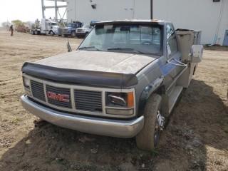 1990 GMC 3500 4X4 Dually Service Truck c/w V8, 4 Speed, 9' Body, PTO. Live Roll and Winch, Showing 176,459 KMS. VIN # 1GDJK34N3LE540600 *Requires Repair*