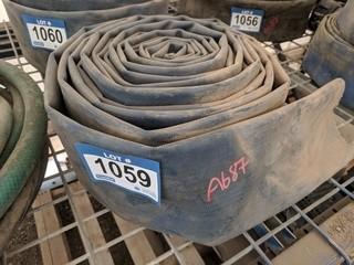 Roll of 4" Water Discharge Hose.