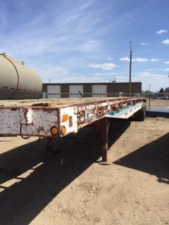 Selling Off-Site 40' T/A Deck Trailer. Note:  Yard Use Only, No Serial Number.   Location:  339 Aquaduct Dr., Brooks, AB Call Tim For Further Information 403-968-9430.
