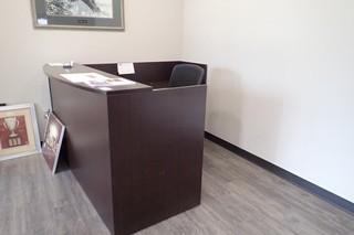 L-Shaped Reception Desk w/ Task Chair and Coat Rack. **CANNOT BE REMOVED UNTIL 3PM MON. JUNE 24/19**