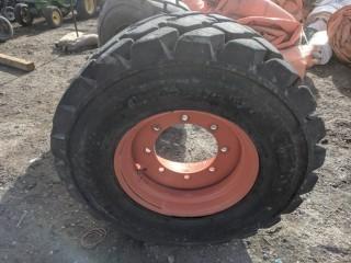 Bobcat 14-17.5 NHS Severe Duty L-5 14 Ply Tire Mounted On 8 Bolt Steel Rim To Fit Bobcat S850.