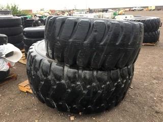 Lot of (2) Assorted Loader Tires.