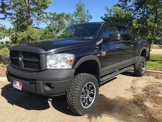 2009 Dodge 2500 4X4 Crew Cab Pickup C/w 5.7L Hemi, A/T, Leather, Sunroof, DVD Player, Lift Kit, Cold Air Intake, After Market Rims, Showing 285,485 Kms. VIN 3D7KS29129G509128 *LOCATED AT FRONTIER MECHANICAL*